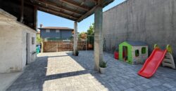 Casa Accostata Con Scoperto
